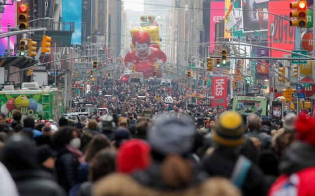 People attend the 95th Macy's Thanksgiving Day Parade in Manhattan, New York City, U.S., November 25, 2021. REUTERS/Brendan McDermid
